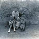 Front: L to R : David and John Hillbery, Raymond Massart Back: Alan Lane, Loline Massart, in front of air raid shelter Taken at: 252 Lynmouth Avenue, Morden, Surrey, 1942