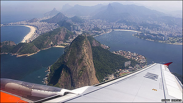An aeroplane flies over Rio De Janiero in Brazil.