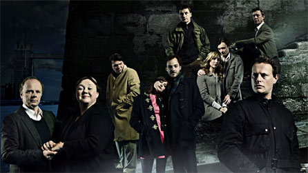 (L-R) Jason Watkins is Mr Boffin, Pauline Quirke is Mrs Boffin, Jamie Foreman is Rogue Riderhood, Lizzy Watts is Lizzie Hexham, Patrick Kennedy is Eugene Wreyburn, Lee Ross is Silas Wegg, Alex Jennings is Charles Dickens, Daisy Haggard is Bella Wilfer, Carl Prekopp is John Rokesmith and Neil Stuke is Bradley Headstone