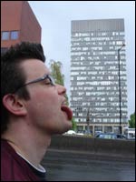 Man appears to lick an office block