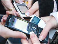 People texting on their mobile phones