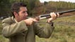 Dougie Vipond aiming a shotgun