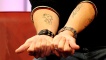 Greg Behrendt's tattoos - as designed by his children