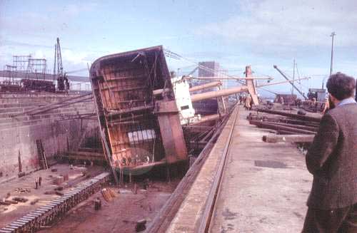 Section of boat having fallen on its side in the dry dock