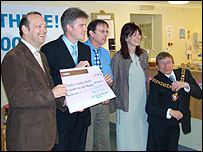 Kate, Dave and the Lord Mayor hand over the cheque