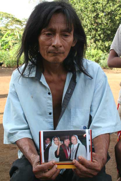 One of the Achuar men holds a picture of his daughter
