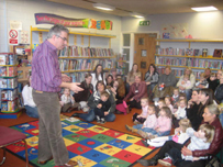 Matthew Davies performs for the group