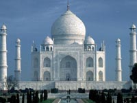 Famous white domes and towers of the Taj Mahal