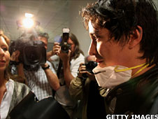 Traveller being interviewed after returning from Mexico