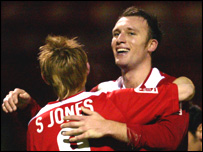 Crewe Alexandra players hugging