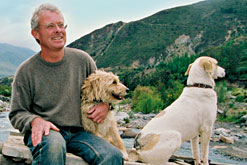 Chris Stewart with his dogs at his home in Andalucia