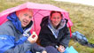 Derek and Becky take shelter and have a picnic. 