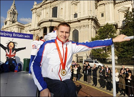 Double Paralympic gold medallist David Weir celebrates at the Heroes parade