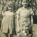 Birthday boy: Paul on his fifth birthday with his sisters, Ruth and Anne.