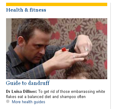 A hairdresser gives a client a haircut