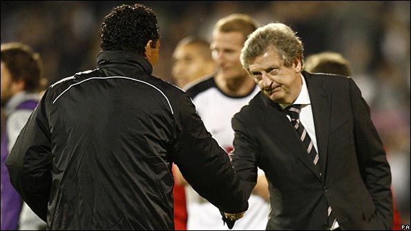 Roy Hodgson shakes hands with the beaten Hamburg boss Ricardo Moniz