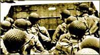 Photograph showing US troops landing on the beaches of Normandy