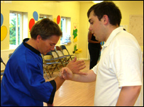 Dance master gives young man a lesson