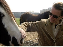Judy and one of the horses.