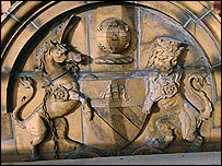 The Manchester coat of arms on the side of Victoria Baths