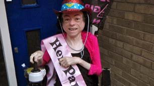 Liz Carr in her hen night hat and sash