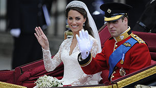 Prince William and Kate Middleton in a carriage