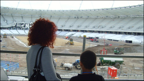 Hilary and her son look out at the Olympic Stadium