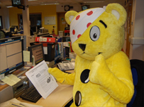 Pudsey visiting a local BBC radio station