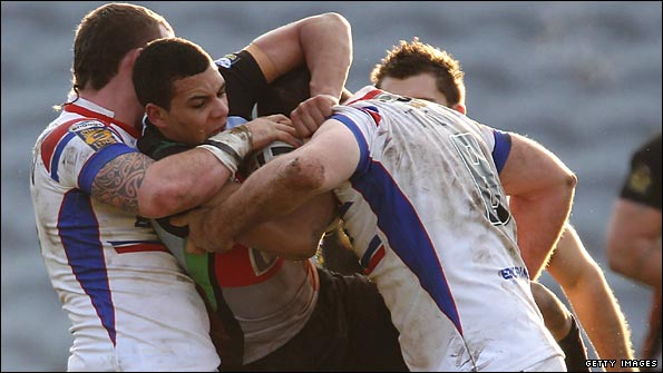 Ben Jones-Bishop is tackled during the game against Wakefield