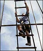 Rob climbing the rigging