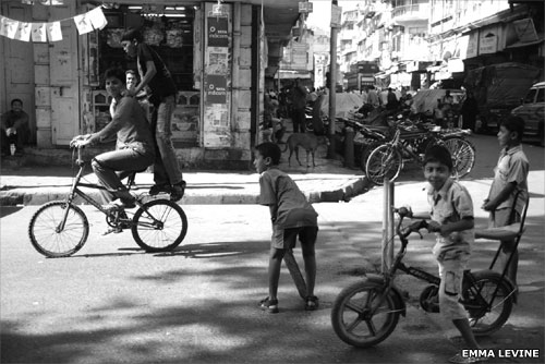 Boys playing street cricket