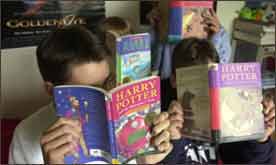 Boys reading Harry Potter
