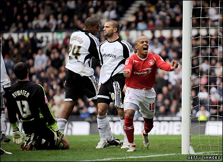 Nottingham Forest striker Robert Earnshaw celebrates scoring against Derby.