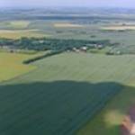 Avro Manchester L7523 EM:M piloted by Flight Sergeant Basil Courtney Wescombe crashed on Mill Hill, Holmpton which is in the centre of this photograph near the end of the long hedge.