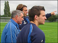 John Gorman watches training with players