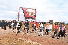 marchers behind a band