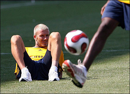 David Beckham takes a break during his first training session with his new team-mates