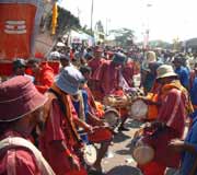 Drummers in brightly coloured costumes