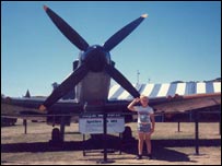 Matt Newsum in front of a Spitfire VB