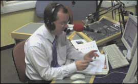 Presenter Andrew Peach live on air