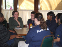 The BBC's Jon Kelly talks to teenagers at Menches Brothers hamburger restaurant in Akron, Ohio
