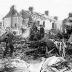 Rescue workers and Air-Raid Wardens hunt through the wreckage on a Hull housing estate following the detonation of a German parachute-mine.