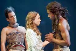 A scene from 'Nation' - EMILY TAAFFE as Daphne; GARY CARR as Mau; JASON THORPE as Milton, a Parrot - Photo by Johan Persson