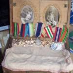 This is my father's ditty box and all his medals. The photos show my mother, and me (David) as a child.
