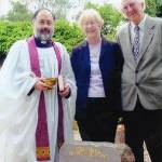 Father Leon Cranberry, Shirley James and Albert Skegg together with the Penge Memorial in the Waterfall Ribbon Garden, 30th June 2004 (Photo curtesy of News Shopper and Beckenham Crematorium)