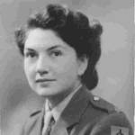 Monica McKevitt in ATS Sergeant's uniform with cross-bow Royal Artillery lapel badge