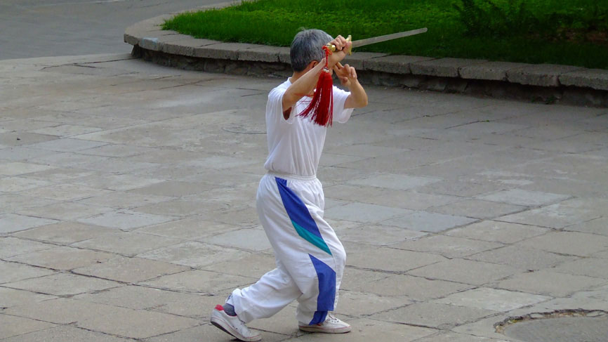 Man practising with a sword.