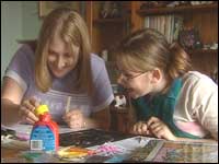 Jenny and Carla painting