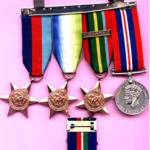 The wrong side of the Merchant Navy medal is shown; this is captured on another picture.