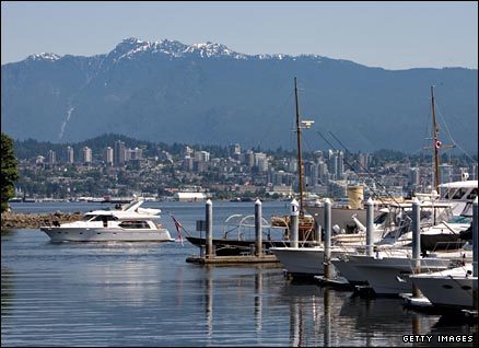 A view of Vancouver's waterfront with the mountains in the background